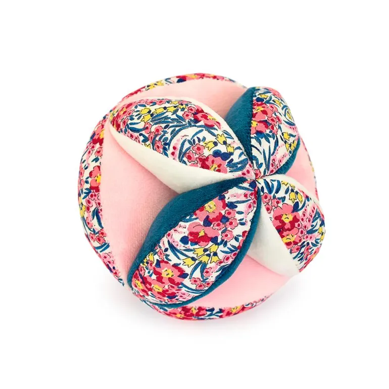 Pelota sensorial sonajero tela floral tonos rosas y azules 15cm